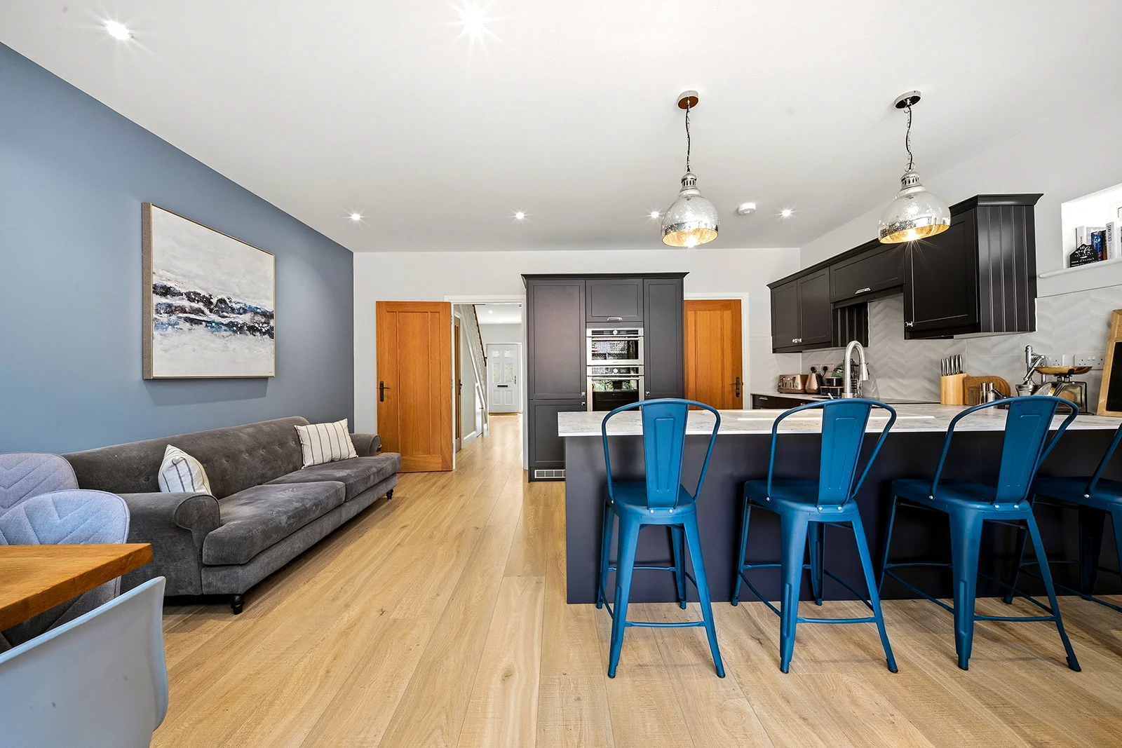 Professionally photographed kitchen with balanced light and straight lines
