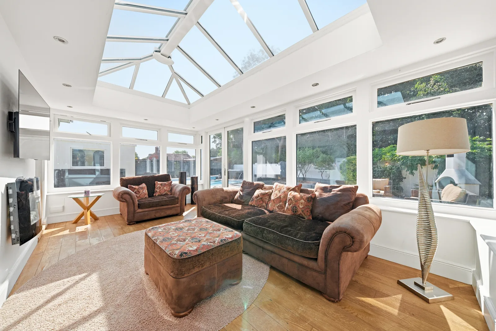 Bright conservatory lounge photographed for a Bournemouth holiday let