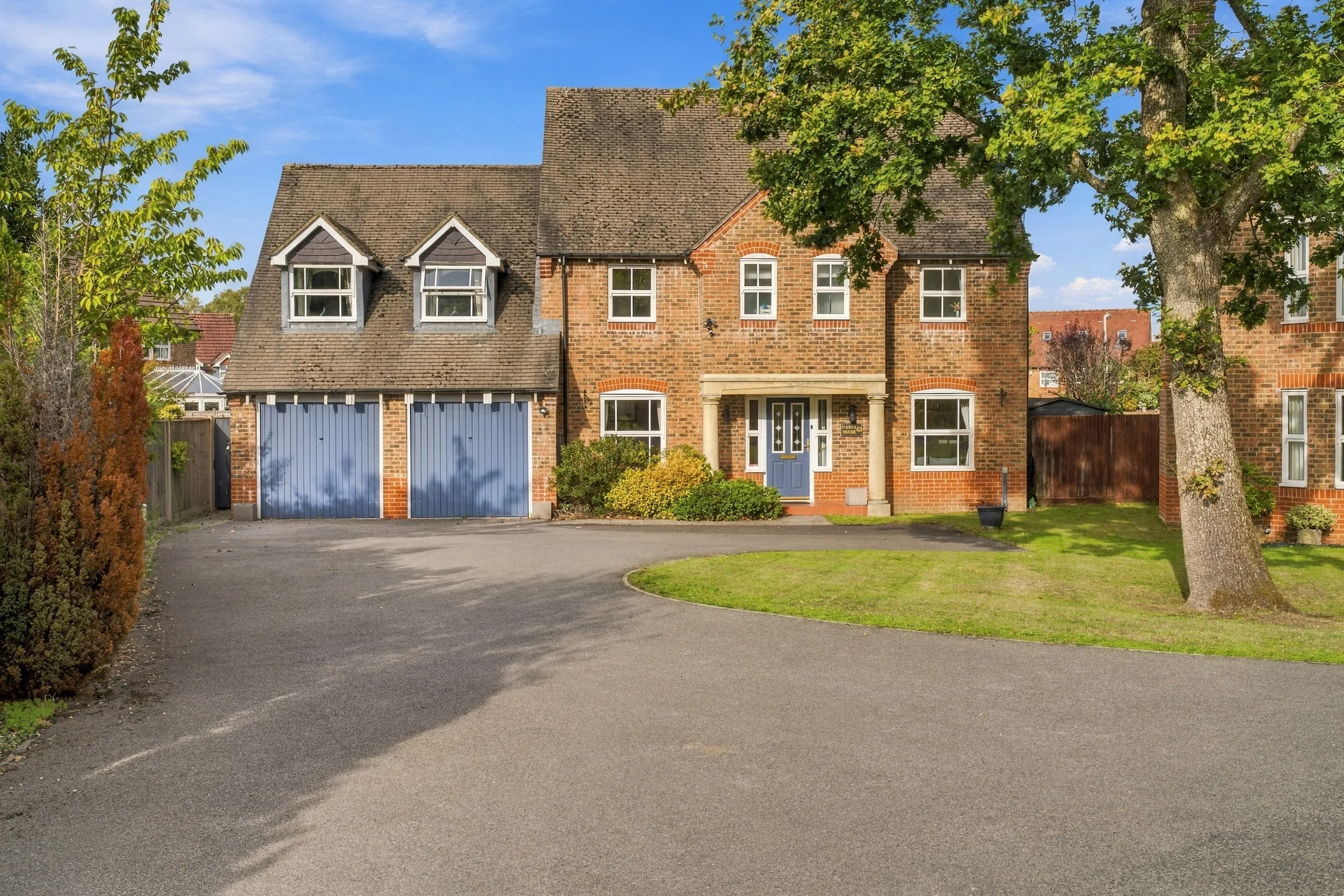 Front exterior and driveway of Hardy House in Ferndown