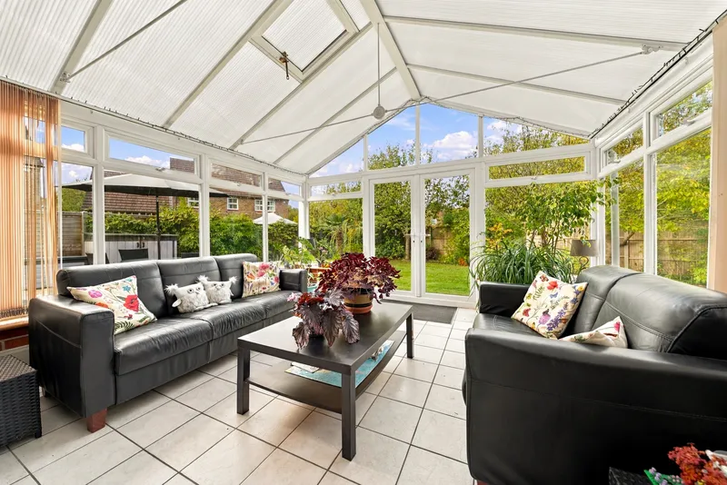 Conservatory seating area overlooking the garden