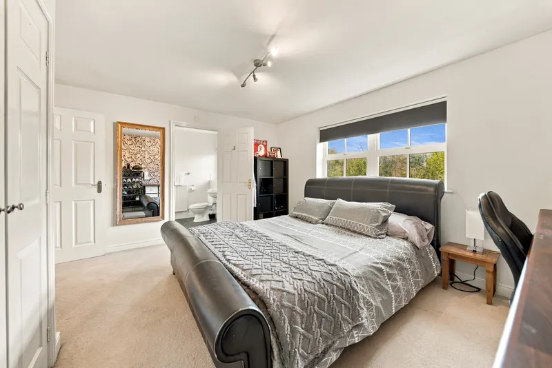 Double bedroom with natural light and garden views