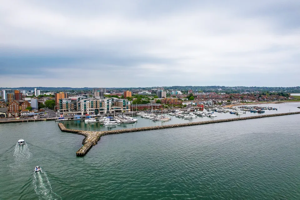 Aerial view of a coastal Dorset holiday let setting