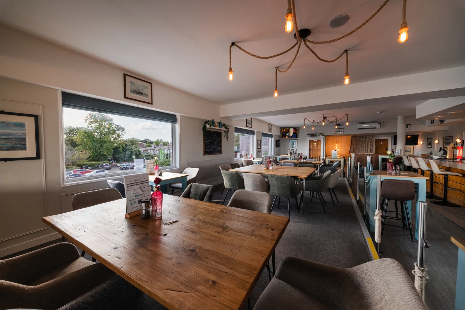 Dining area beside the waterfront windows